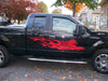 red tiger flames decal on black truck